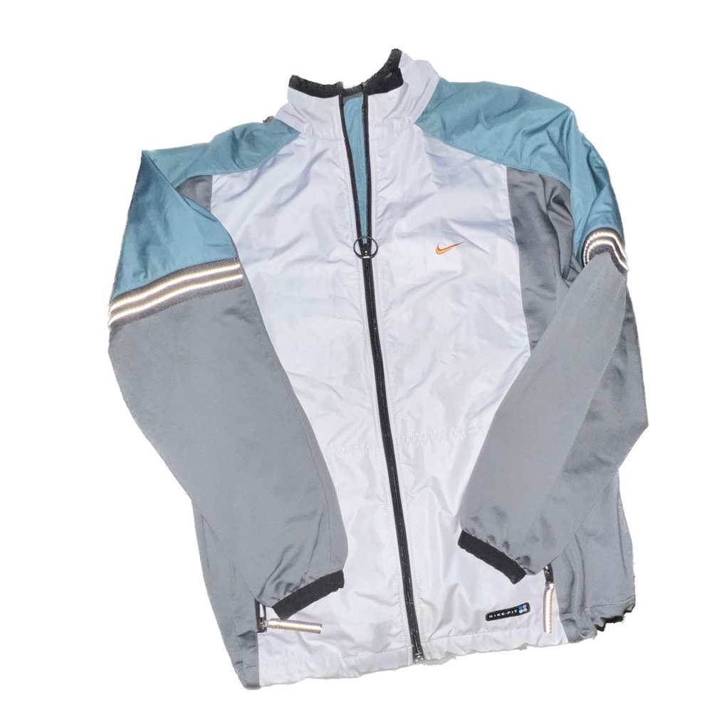 Nike Dri Fit Women’s Running Jacket. Reflective stitching on arms. Size Large.